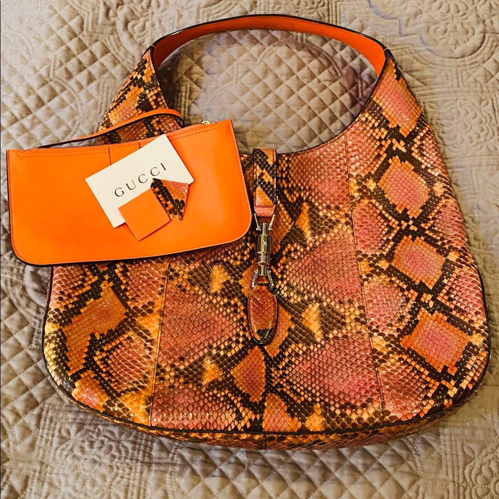 Stunning pink, orange and brown snake skin Gucci purse.